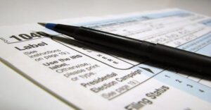 tax-form-and-a-pen-pv